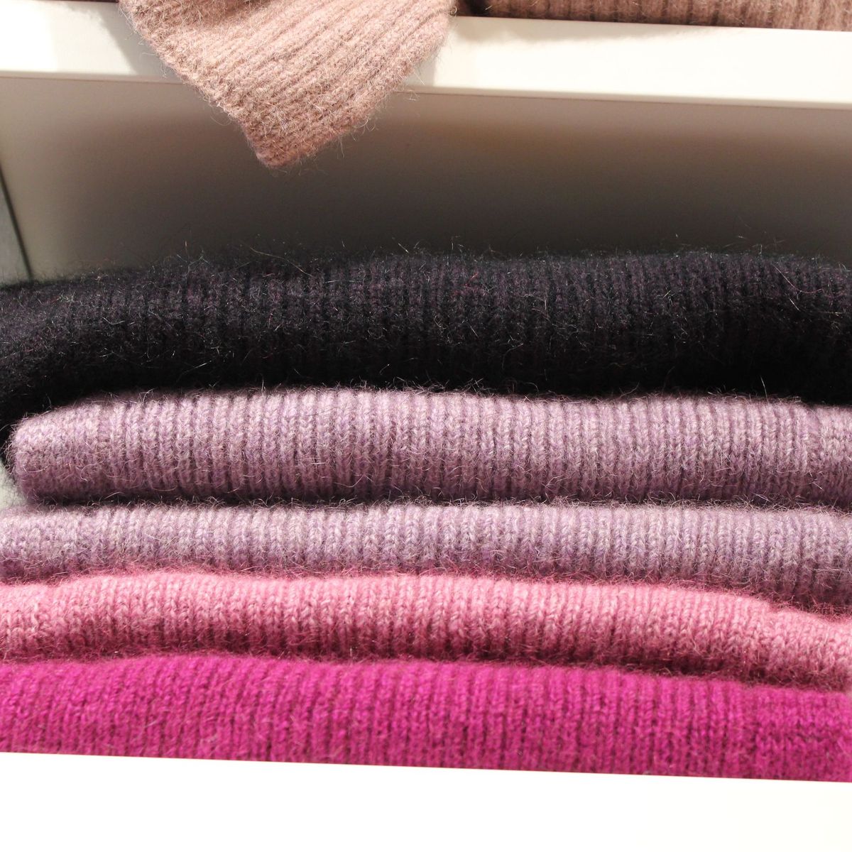 Stack of folded wool knitwear